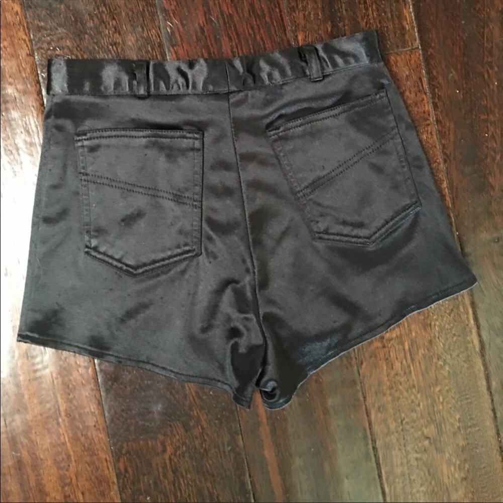 Tiny black shiny high waisted shorts